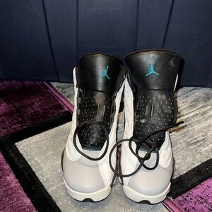 Jordan Retro 5 Sneakers in White, Black & Teal Accent